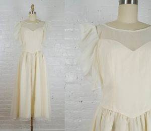 1970s cream white chiffon tea length dress with statement sleeves . small