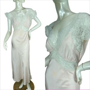 1940s pink rayon bias cut nightgown with lace inserts and flutter sleeves
