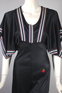 Black jersey 70s bellbottom jumpsuit rainbow trim | S-M - Fashionconstellate.com