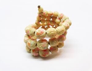 1930s Pastel Pink Orange Overdyed Floral Carved Bone Bead Triple Strand Expansion Bracelet - Fashionconstellate.com