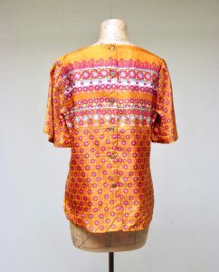 Vintage 1960s Orange Indian Print , 60s Alex Colman Short Sleeve Back Button Top, Medium - Fashionconstellate.com