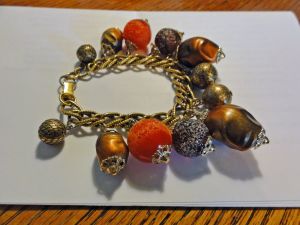 Vintage 50s Beaded Coro Charm Bracelet Autumn Tone Brown Orange Plastic Sugar Beads Goldtone Chain - Fashionconstellate.com