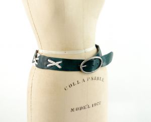 Linea Pelle leather belt with oval shapes and braided Xs dark green and white Southwestern belt - Fashionconstellate.com