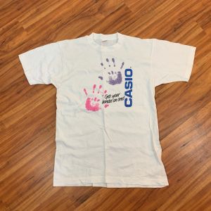 1980's Casio ''Get your hands on one'' Cotton Tee | Size L | Single Stitch | 42'' Chest | 30'' Length - Fashionconstellate.com