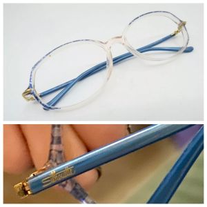 Vintage Unisex 1980’s Clear and Blue Eyeglasses Frames Model 1899 by Silhouette - Fashionconstellate.com