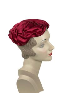 1950s red silk satin cocktail hat with lovely draping